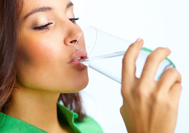 girl drinking water dr joy dental clinic