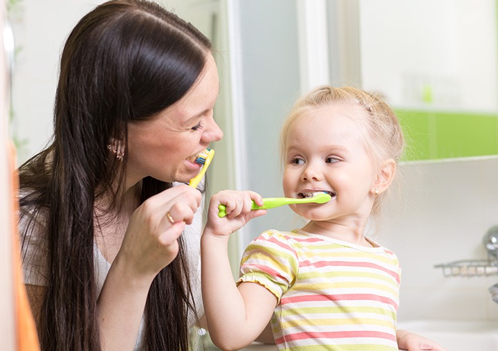 mother and child brushing cover image