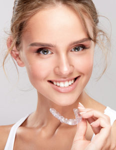 girl-smiling-with-invisalign