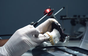 lab technician working on dental smile