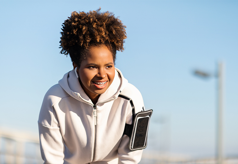 lady running wearing braces